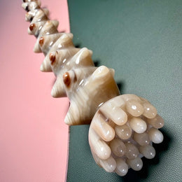 Pale Ivory Yak Horn Massage Wand — Star-Ridged, Lotus Pod Head